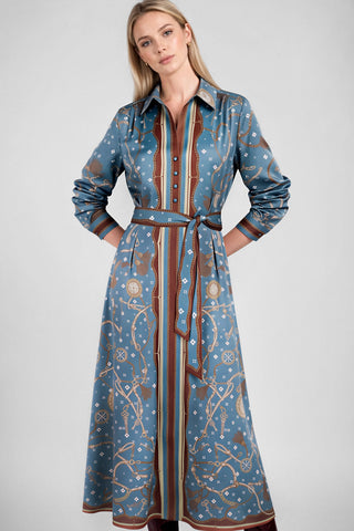 Model wearing a printed collared long sleeve button-down midi dress with belt and chain pattern