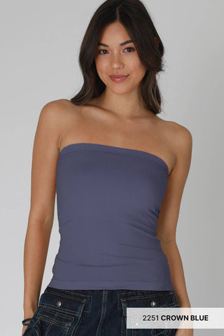 NIKIBIKI Crown Blue two-layer strapless tube top paired with dark denim jeans