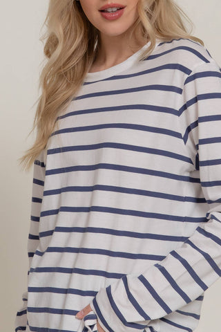 Women's white long sleeve tee with navy blue horizontal stripes, round neck