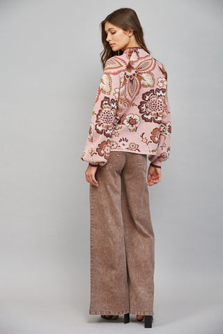 FATE pink floral print sweater with balloon sleeves, worn with wide-leg brown jeans