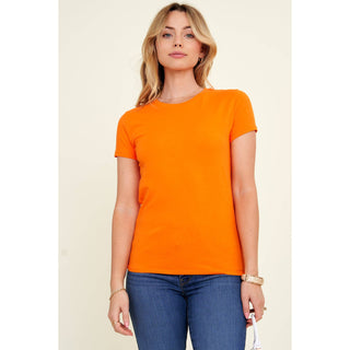 Women's orange crew neck short sleeve fitted knit t-shirt with blue jeans