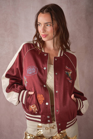 The Patsy Western Patch Satin Varsity Jacket in Rust