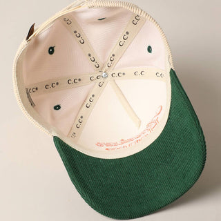 Inside view of cream and green corduroy trucker cap by C.C with orange embroidery