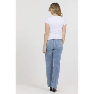 White crew neck short sleeve fitted knit tee shown from the back on a model