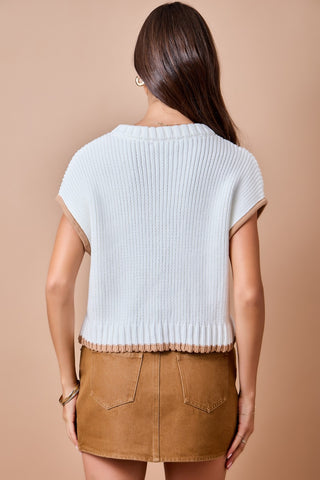 Ivory ribbed knit sweater vest top with brown contrast trim, back view
