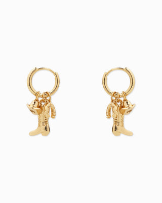 Gold huggie hoop earrings with cowboy boot, hat, and horseshoe charms