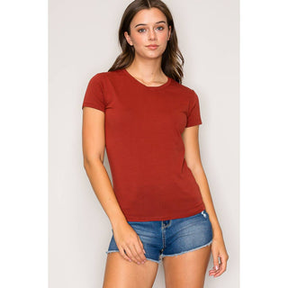 Women's rust red crew neck short sleeve fitted knit t-shirt with denim cutoff shorts