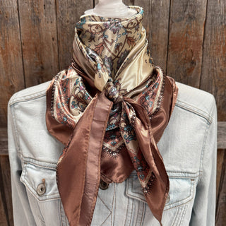 Brown and aqua floral satin wild rag scarf tied on denim jacket mannequin