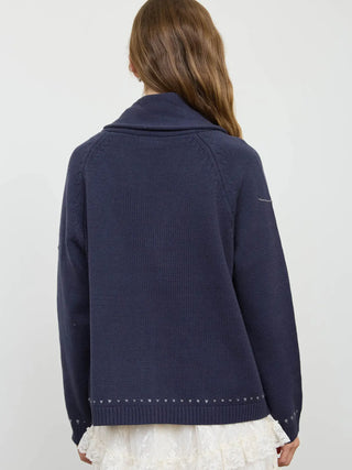 Navy blue shawl collar knit cardigan with heart jacquard trim, back view