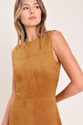 Close-up detail of a sleeveless faux suede midi dress with round neckline on a model