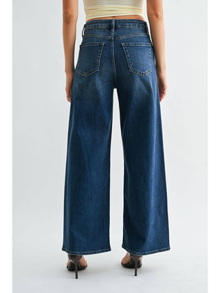 Back view of high-rise wide leg jeans with regular hem on a female model