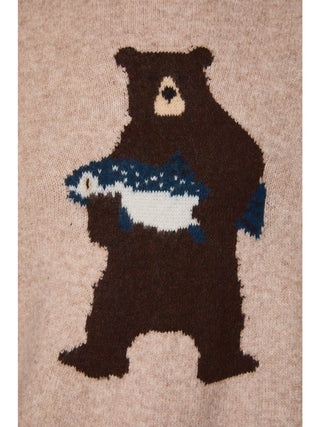 Close-up knit detail of bear holding fish graphic on oversized crew neck sweater