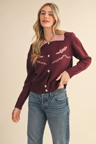 Burgundy western cardigan with pink embroidery details and contrast collar