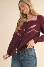Burgundy western cardigan with pink collar, embroidered details, and gold buttons