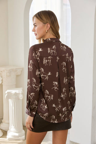 Back view of a long-sleeve button-down shirt with allover horse print pattern