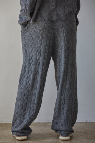 Dark heather grey cable-knit wide-leg jogger pants with elastic waistband, back view
